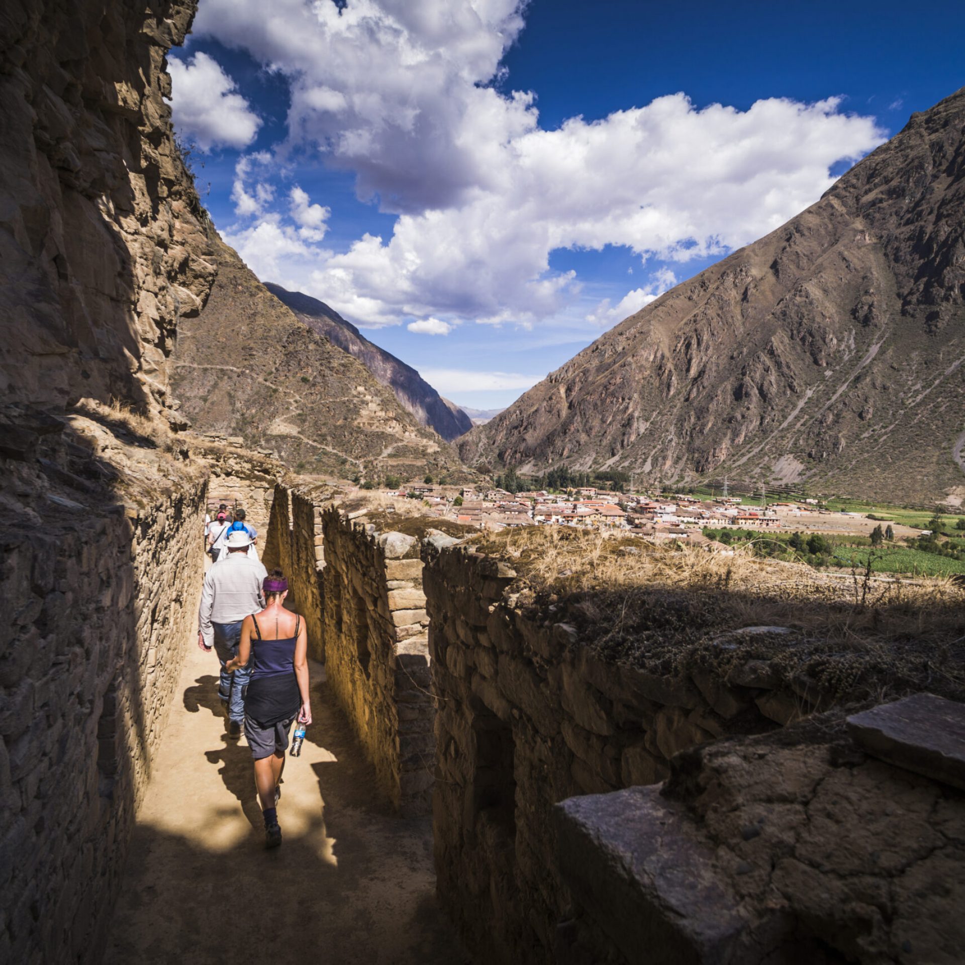 Tourists exploring Inca Ruins of Ollantaytambo, Sacred Valley of the Incas (Urubamba Valley), near C